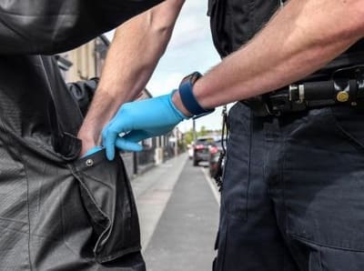 Police stop and search powers - searching man's pockets